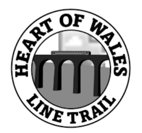Logo "Heart of Wales Line Trail" mit Viadukt und Zug